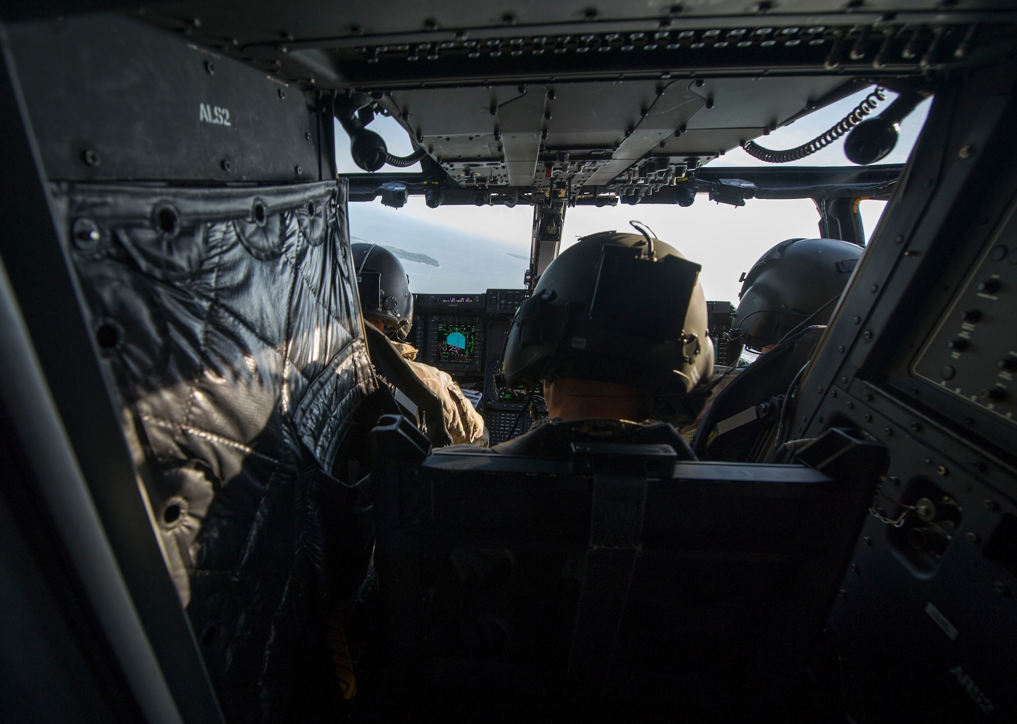 CV-22 Osprey aircrew members navigate during a training flight at Hurlburt Field, Fla., April 27, 2016. The Osprey is a multi-mission tilt-rotor aircraft with vertical takeoff and landing capability. (U.S. Air Force photo by Senior Airman Krystal M. Garrett) 