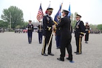 YONGSAN GARRISON, SEOUL, South Korea (April 30, 2016) - Gen. Vincent k. Brooks Takes the U.S. Forces Korea colors from Adm. Harry B. Harris, the commander of Pacific Command during a change of command ceremony in which Brooks took command of United Nations Command, Combined Force Command and U.S. Forces Korea. 