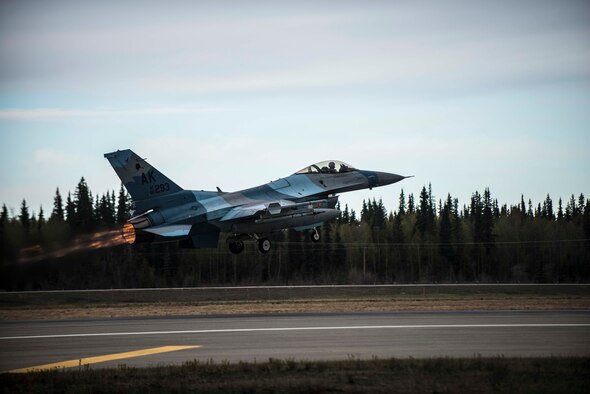 A U.S. Air Force F-16 Fighting Falcon assigned to the 18th Aggressor Squadron takes off from Eielson Air Force Base, Alaska, May 2, 2016, during RED FLAG-Alaska (RF-A) 16-1. Aggressor pilots are trained to act as opposing forces in exercises like RF-A to better prepare U.S. and allied forces for aerial combat. (U.S. Air Force photo by Staff Sgt. Joshua Turner/Released)