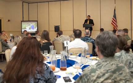 Jason Bowen, a Charleston County Sherriff’s Office Special Victims Unit detective, speaks at the Child Abuse Prevention Luncheon April 26, 2016 at Joint Base Charleston . During his speech Bowen gave tips on how to prevent children from becoming victims of cyber predators. (U.S. Air Force Photo/Airman Megan Munoz)