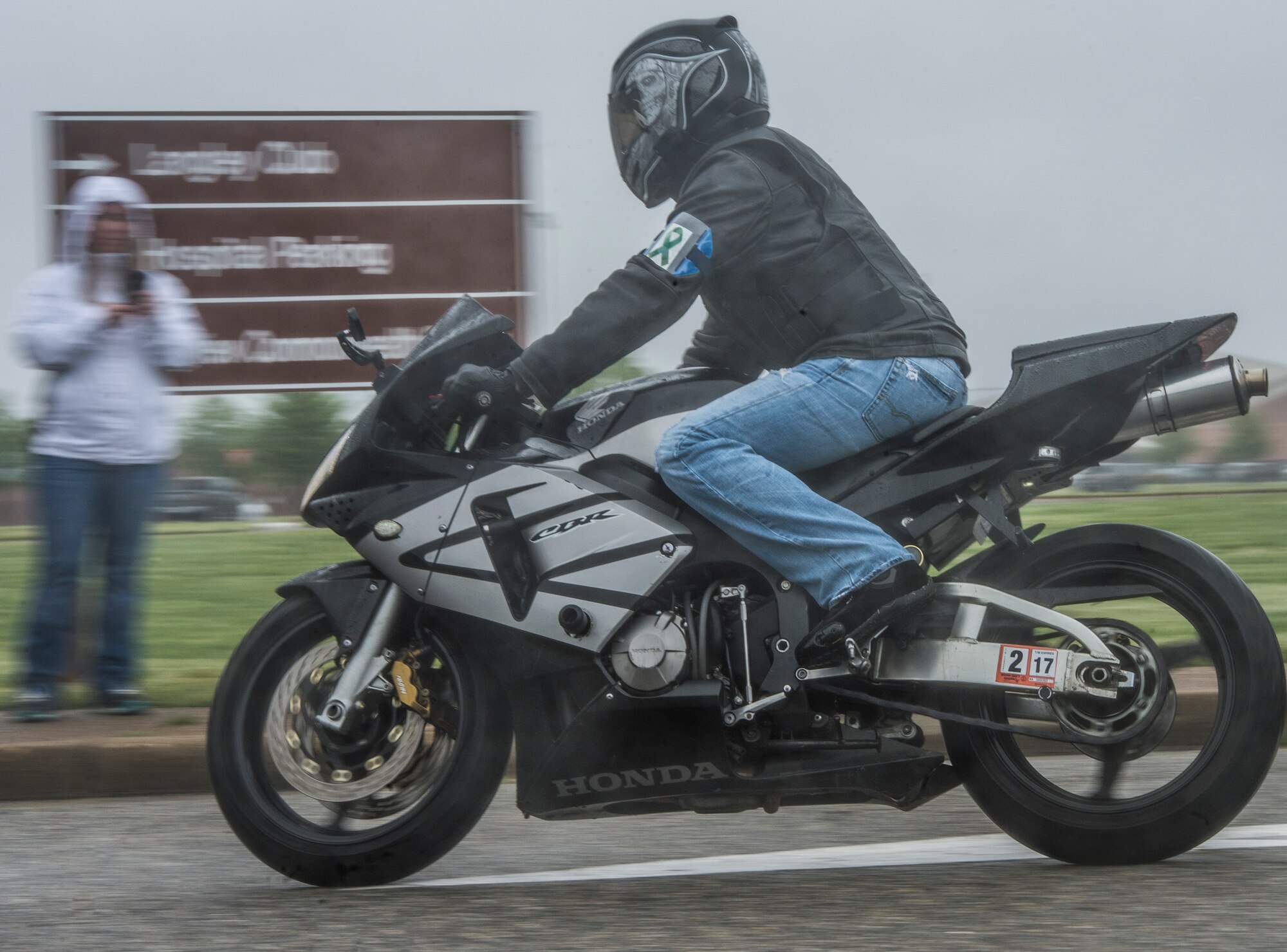 A motorcyclist begins the 5th annual Standing Together Against Rape Road Rally begin their ride at Langley Air Force Base, Va., April 29, 2016. The ride was designed to increase awareness of sexual assault in an effort to eliminate it from happening, while riders represented the one in six females and one in eight male Service members that are sexually assaulted each year. (U.S. Air Force photo by Senior Airman Kayla Newman)