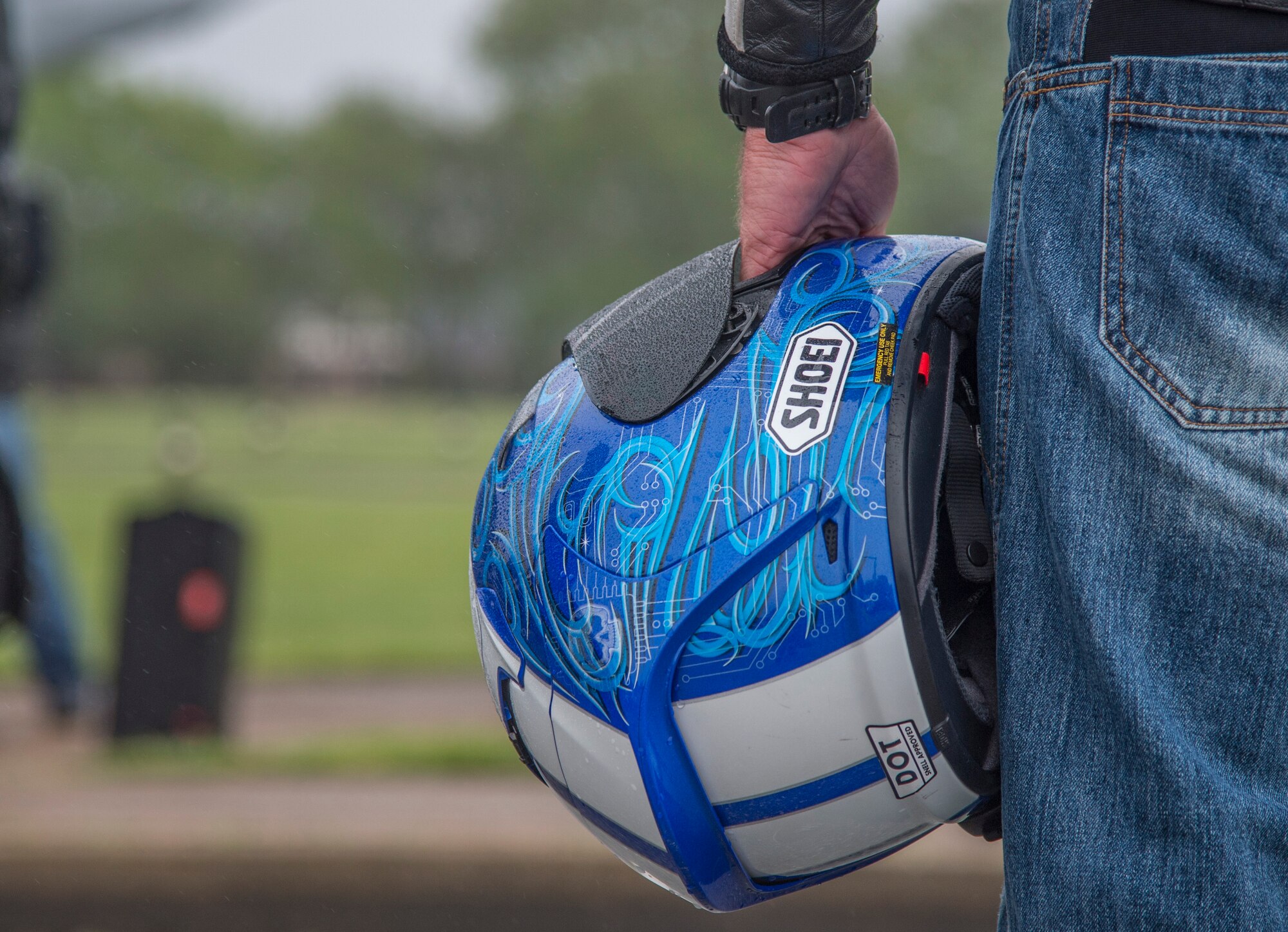 A motorcyclist prepares for the 5th annual Standing Together Against Rape Road Rally at Langley Air Force Base, Va., April 29, 2016. Prior to the rally, riders signed a pledge to stop sexual assault. (U.S. Air Force photo by Senior Airman Kayla Newman)