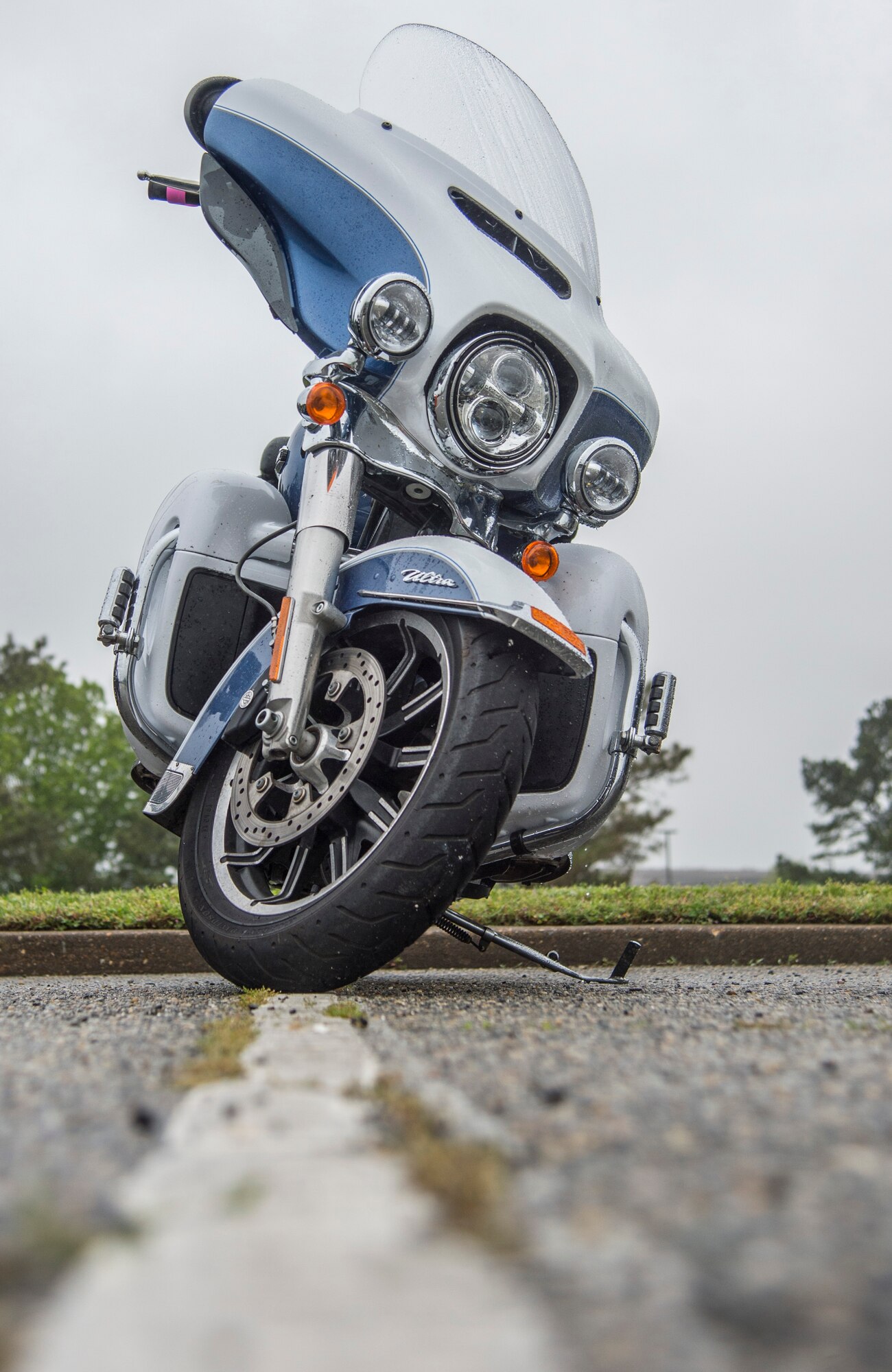 A motorcycle awaits it rider during the 5th annual Standing Together Against Rape Road Rally at Langley Air Force Base, Va., April 29, 2016. Each motorcycle rider represented the one out of six female Service members and one out of eight male Service members who have been sexually assaulted each year. (U.S. Air Force photo by Senior Airman Kayla Newman)