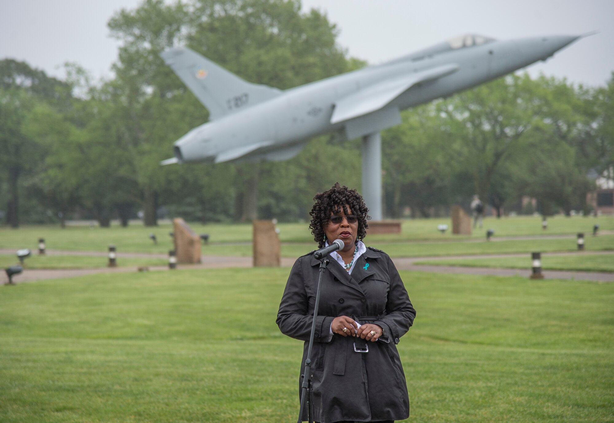 Bernadette Hardy, sexual assault response coordinator for the 633rd Air Base Wing Sexual Assault Prevention and Response Program, addresses motorcycle riders prior to the start of the 5th annual Standing Together Against Rape Road Rally at Langley Air Force Base, Va., April 29, 2016. The ride was open to all Service members, civilians and family members, and U.S. Army Col. Joseph Ladner, vice commander of the 633rd ABW, gave the opening remarks. (U.S. Air Force photo by Senior Airman Kayla Newman)