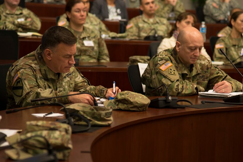 U.S. Army Maj. Gen. Anthony C. Funkhouser, right, commander of U.S. Army Training and Doctrine Command’s Center for Initial Military Training, and Col. William Galbraith, commander of the 733rd Mission Support Group, take notes during a senior leader lecture about sexual assault predators at Fort Eustis, Va., April 20, 2016. The audience consisted of installation command teams, sexual assault and response coordinators and victim advocates. (U.S. Air Force photo by Senior Airman Kristina LaCoste)