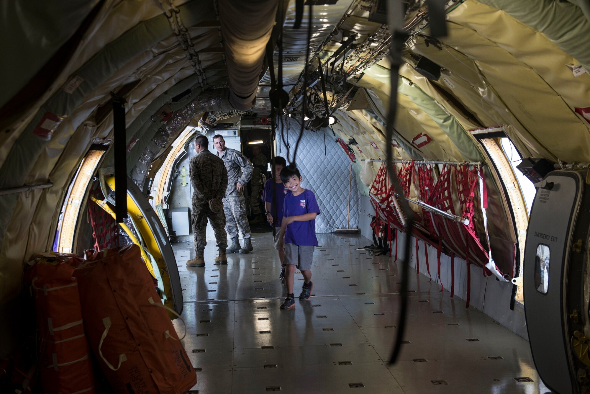 Students from the Okinawa Christian School International get an inside look at a U.S. Air Force KC-135 April, 28, 2016 at Kadena Air Base, Japan. The 18th Component Maintenance Squadron provided a tour for local students to show real-life applications for the physics they were studying at school. (U.S. Air Force photo by Senior Airman Omari Bernard)