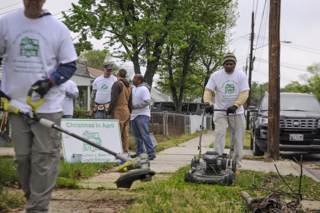 Volunteers from the 113th Wing, District of Columbia Air National Guard make repairs to the home of Grace Williams, 75, as part of the in Prince George’s County’s Christmas in April program Forestville, Md, April 30. The program allowed for the members of the DCANG to give back to their community and help those in need. (U.S Air National Guard photo by Capt. Nathan Wallin)