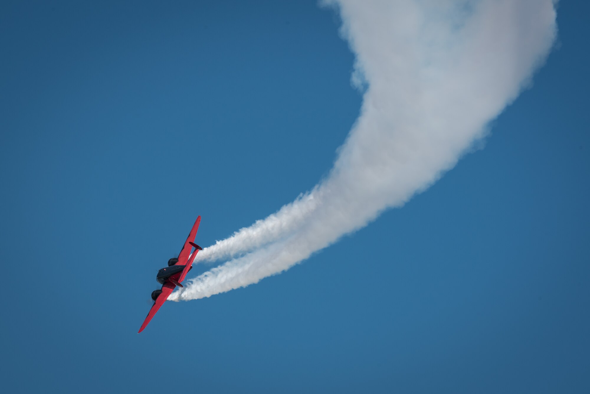 Matt Younkin performs aerobatic stunts with his Twin Beech 18 aircraft during the Thunder Over Louisville air show in downtown Louisville, Ky., April 23, 2016. The event drew an estimated crowd of 725,000 spectators to the banks of the Ohio River. (U.S. Air National Guard photo by Maj. Dale Greer)