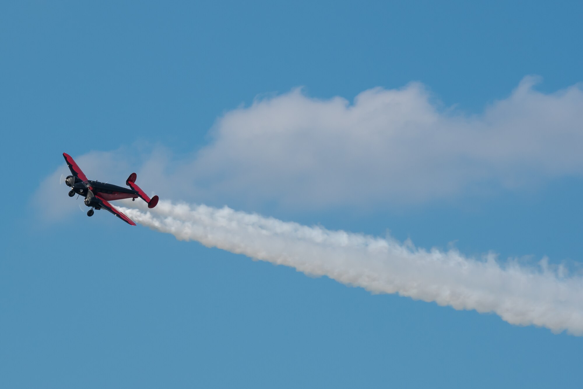 Matt Younkin performs aerobatic stunts with his Twin Beech 18 aircraft during the Thunder Over Louisville air show in downtown Louisville, Ky., April 23, 2016. The event drew an estimated crowd of 725,000 spectators to the banks of the Ohio River. (U.S. Air National Guard photo by Maj. Dale Greer)