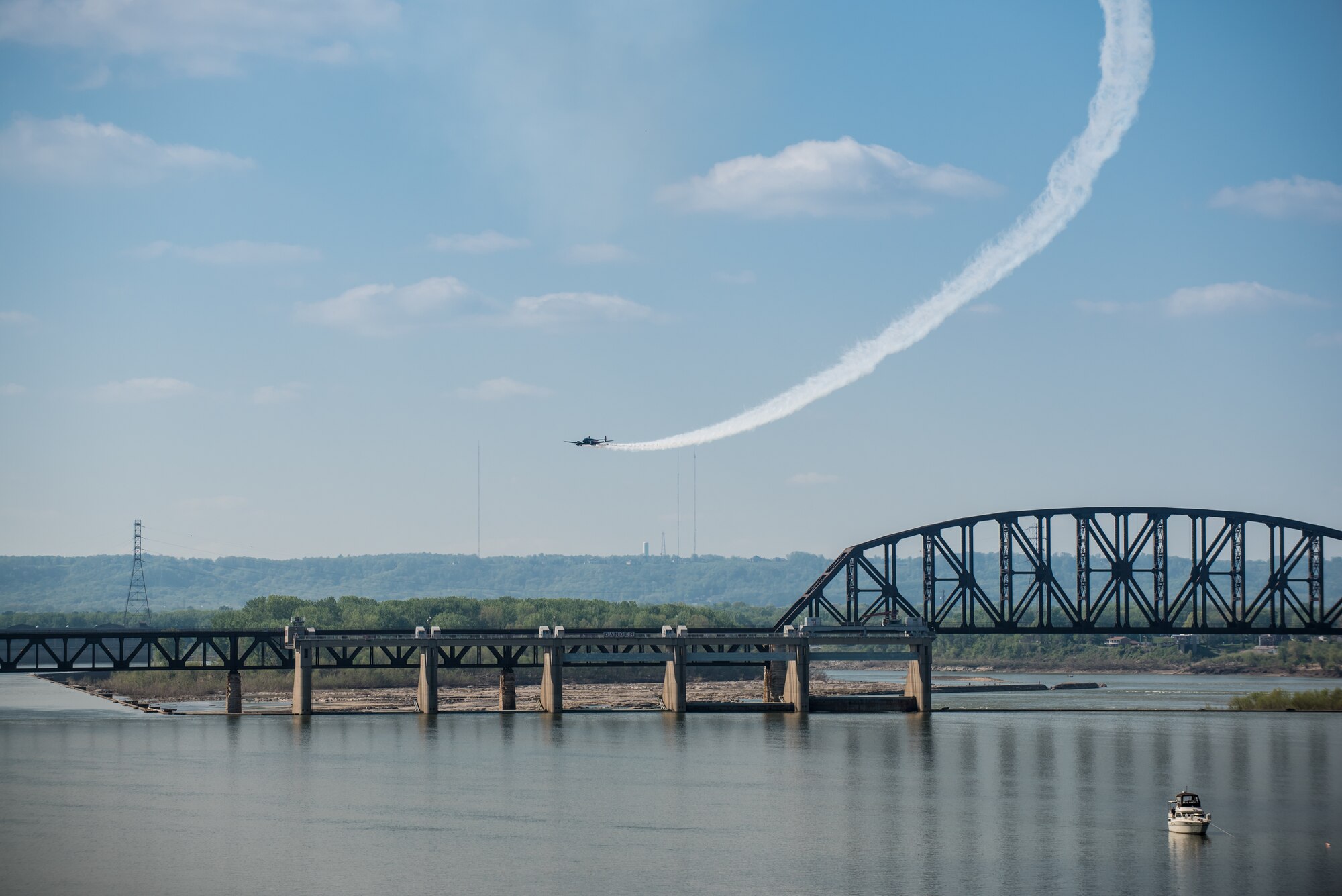 Matt Younkin performs aerobatic stunts with his Twin Beech 18 aircraft during the Thunder Over Louisville air show in downtown Louisville, Ky., April 23, 2016. The event drew an estimated crowd of 725,000 spectators to the banks of the Ohio River. (U.S. Air National Guard photo by Maj. Dale Greer)