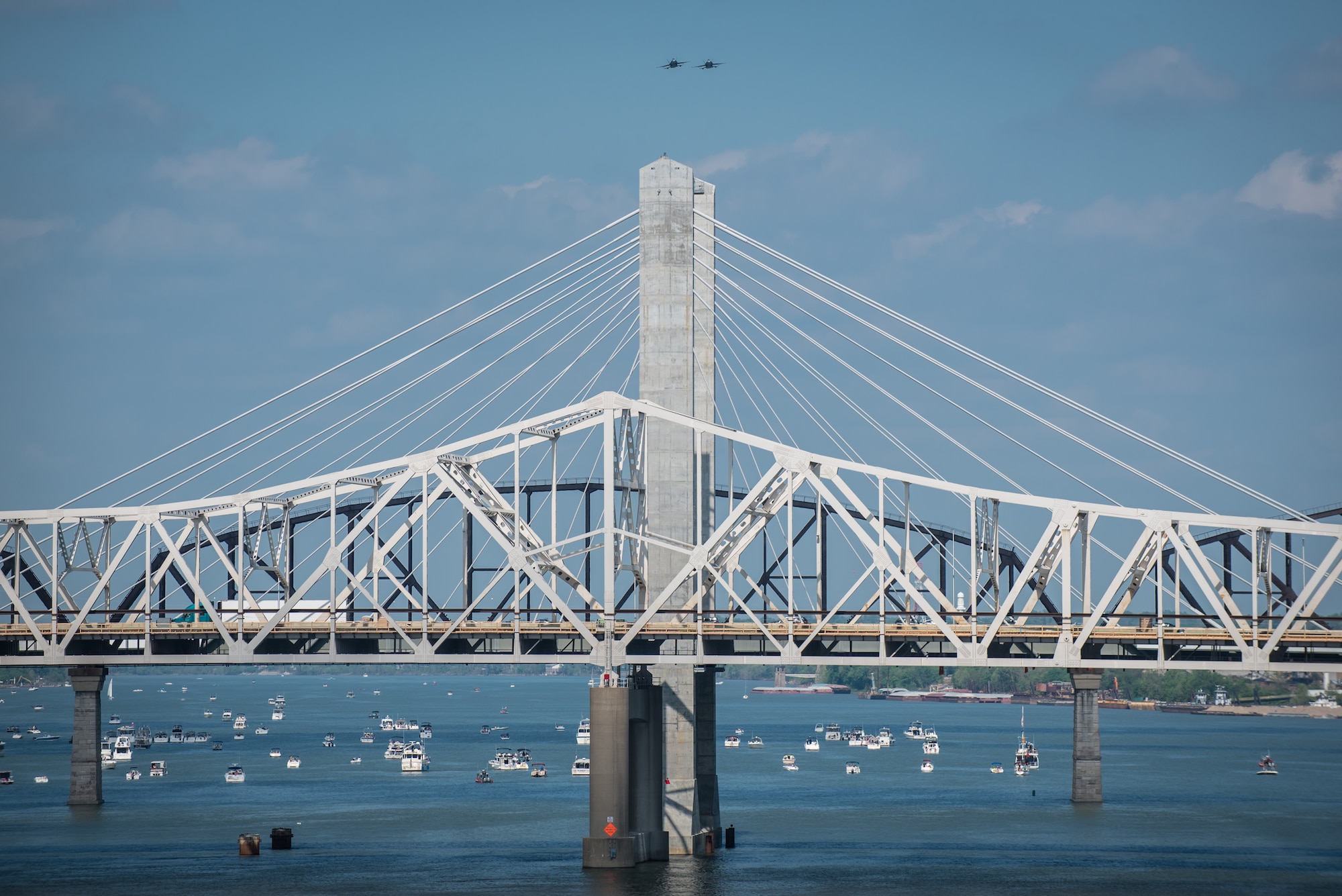 Two Royal Canadian Air Force CF-18 Hornet fighter jets approach the show box during the Thunder Over Louisville air show in downtown Louisville, Ky., April 23, 2016. The event drew an estimated crowd of 725,000 spectators to the banks of the Ohio River. (U.S. Air National Guard photo by Maj. Dale Greer)