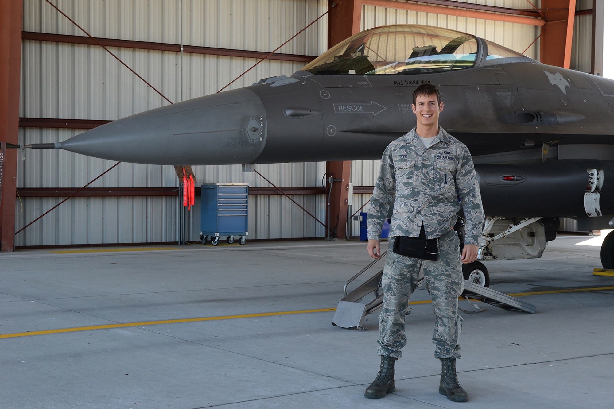 U.S. Air Force Senior Airman Curtis Nye, a weapons loader assigned to the South Carolina Air National Guard's 169th Maintenance Squadron, performs maintenance checks on an F-16 Fighting Falcon fighter jet at McEntire Joint National Guard Base, S.C., April 16, 2016. (U.S. Air National Guard photo by Senior Airman Ashleigh Pavelek)