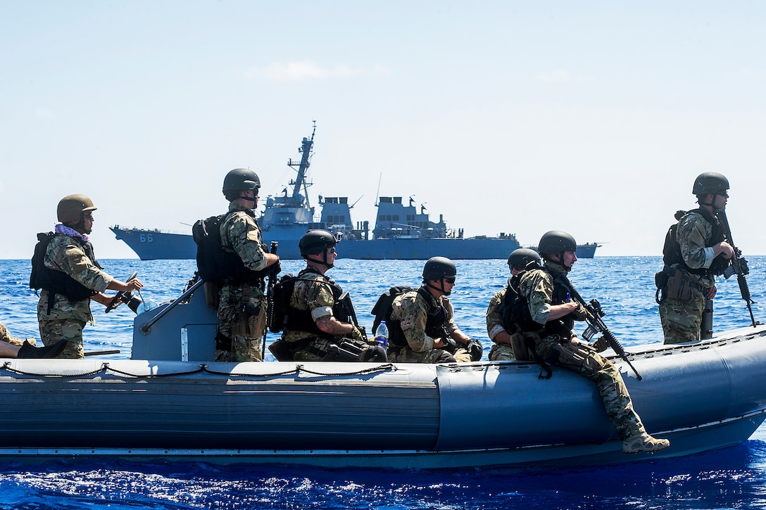 Members of the visit, board, search, and seizure team for the USS Gonzalez operate a rigid-hull inflatable boat in the Gulf of Aden, April 26, 2016. The giuded-missile destroyer is supporting Operation Inherent Resolve, maritime security operations and theater security cooperation efforts in the U.S. 5th Fleet area of operations. Navy photo by Petty Officer 3rd Class Pasquale Sena