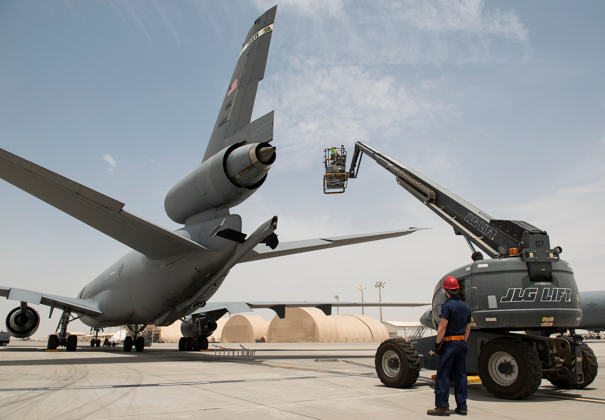 Airmen from the 380th Expeditionary Aircraft Maintenance Squadron inspect a KC-10 Extender on April 28, 2016, at an undisclosed location in Southwest Asia. The KC-10 provides air refueling capabilities to U.S. and coalition aircraft in the CENTCOM theater. (U.S. Air Force Photo by Staff Sgt. Chad Warren)