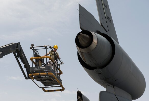 Airmen from the 380th Expeditionary Aircraft Maintenance Squadron inspect a KC-10 Extender on April 28, 2016, at an undisclosed location in Southwest Asia. The KC-10 provides air refueling capabilities to U.S. and coalition aircraft in the U.S. Central Command theater. (U.S. Air Force photo/Staff Sgt. Chad Warren)