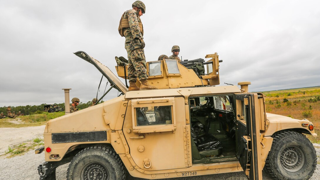 Marines with Combat Logistics Regiment 2 participate in familiarization training with the MK-19 automatic grenade launcher at shooting range G-3 at Marine Corps Base Camp Lejeune, Apr. 29, 2016. The training honed their accuracy, communication abilities and suppressive fire capabilities. 