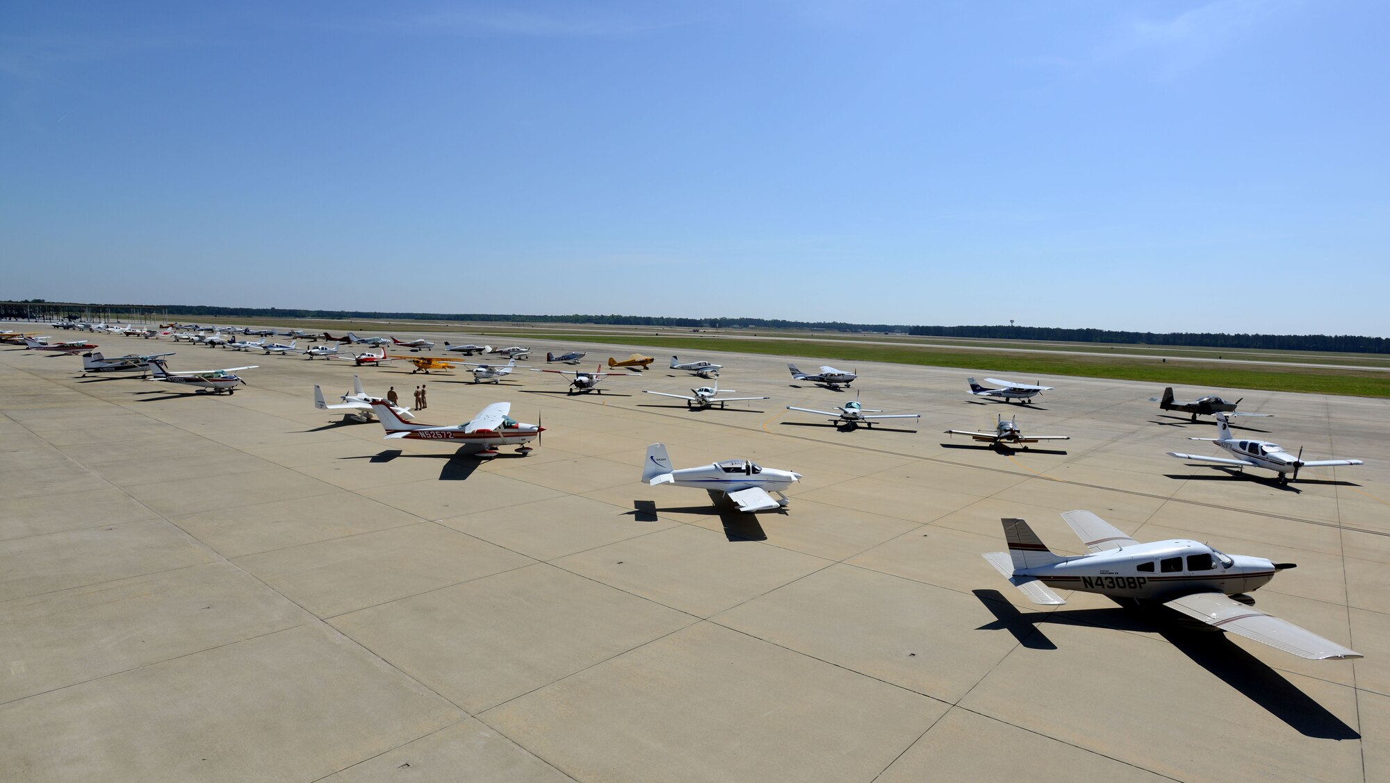 Aircraft line the runway at Shaw Air Force Base, S.C., April 29, 2016. The 20th Fighter Wing invited civilian pilots from all over the region to participate in a General Aviation Fly-In event. (U.S. Air Force photo by Airman 1st Class Kelsey Tucker)