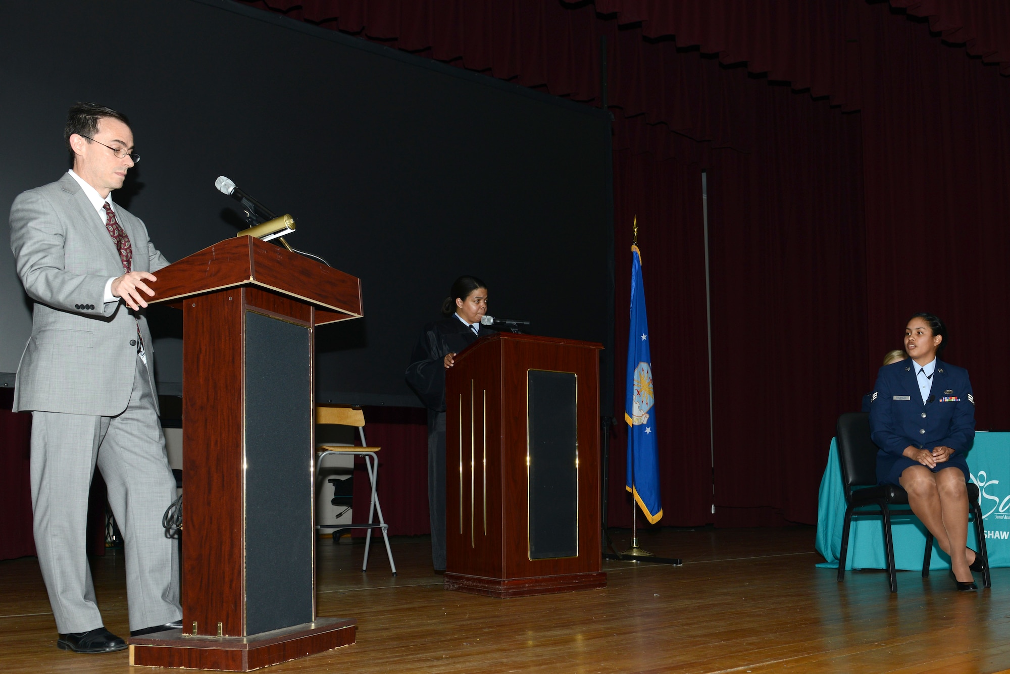 Dan Breen, acting as the defendant’s lawyer, questions U.S. Air Force Senior Airman Andrea Raudales, acting as the alleged victim, in a mock sexual assault court martial at Shaw Air Force Base, S.C. April 28, 2016. The 20th Fighter Wing Judge Advocate office in collaboration with the 20th FW Sexual Assault Prevention and Response office hosted the mock court martial to educate young Airmen on sexual assault and the dangers of risky behavior where alcohol and sex are involved. (U.S. Air Force photo by Airman 1st Class Destinee Dougherty)