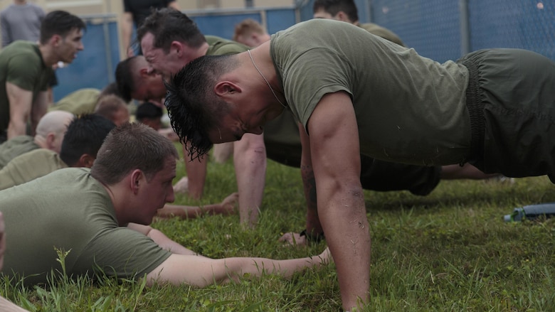 Petty Officer 2nd Class Thomas O. Dugan (right), a hospital corpsman with Headquarters and Service Company, 6th Engineer Support Battalion, 4th Marine Logistics Group, Marine Forces Reserve, completes the initial physical screening test for a Fleet Marine Force reconnaissance corpsman evaluation in San Antonio, April 19, 2016. The screening was hosted by 4th Reconnaissance Battalion, 4th Marine Division, Marine Forces Reserve, for Sailors across Marine Forces Reserve and the U.S. Navy Reserve to gain familiarity with the demands of the FMF reconnaissance corpsman pipeline. 