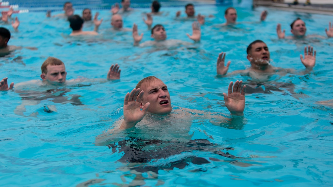 Sailors from Marine Forces Reserve and the U.S. Navy Reserve tread water as part of a water confidence exercise during a Fleet Marine Force reconnaissance corpsman screening in San Antonio, April 19, 2016. The screening was hosted by 4th Reconnaissance Battalion, 4th Marine Division, Marine Forces Reserve, for Reserve Sailors to gain familiarity with the demands of the FMF reconnaissance corpsman pipeline. 