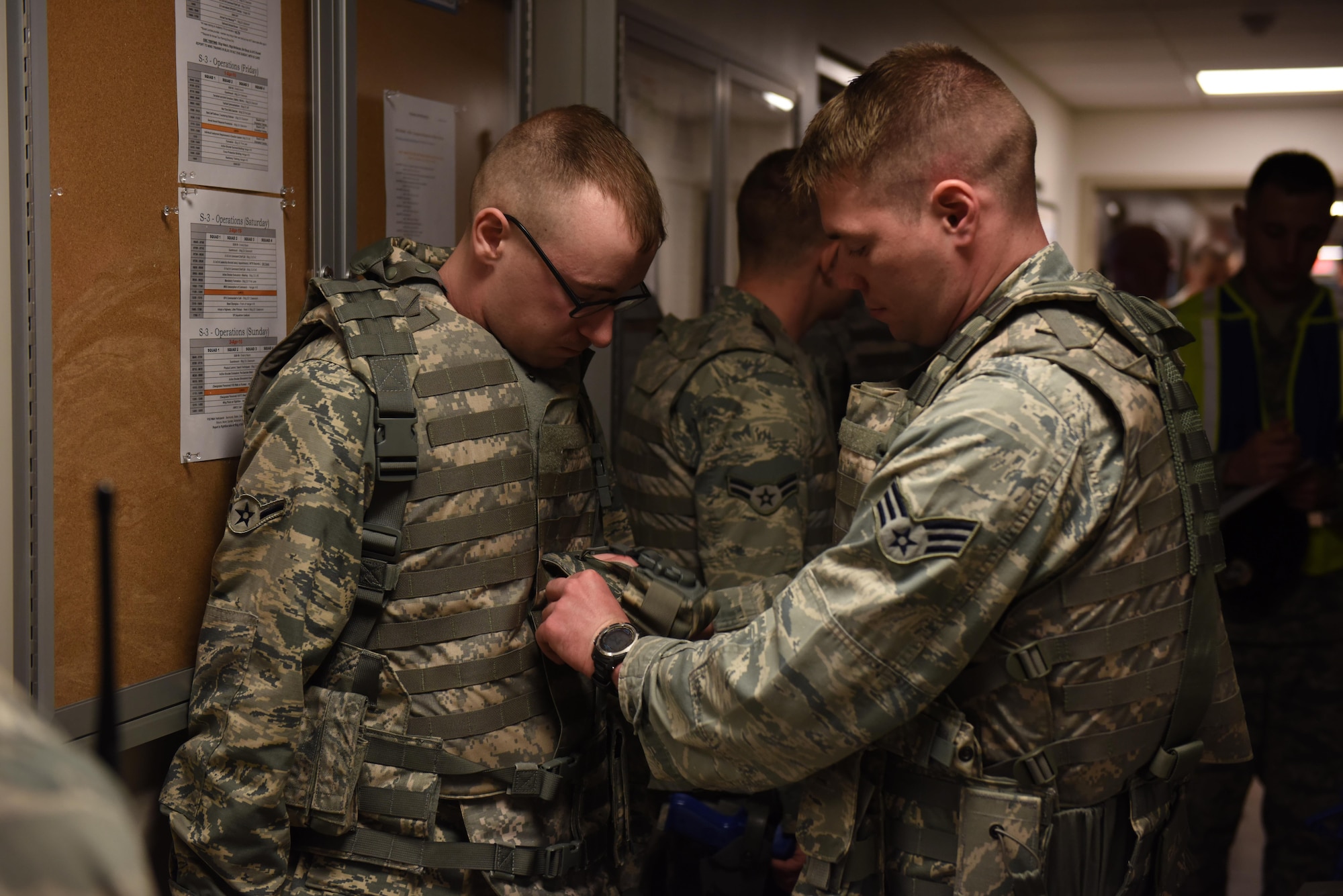 Members of the 911th Security Forces Squadron prepare for a training exercise at the Pittsburgh International Airport Air Reserve Station, April 1, 2016. The exercise tested the fire team’s ability to communicate and respond to an improvised explosive device and an intruder on base. (U.S. Air Force Photo by Airman Bethany Feenstra)