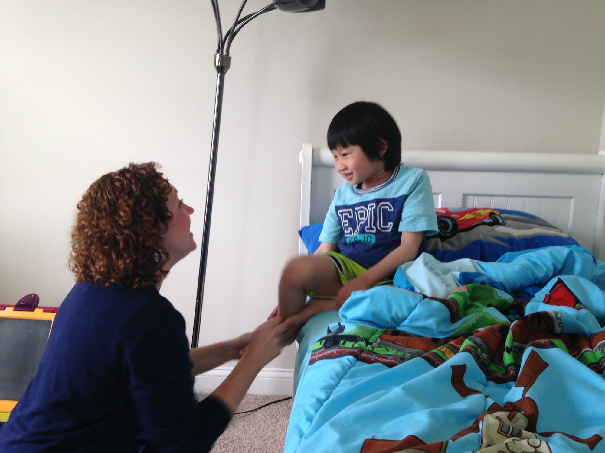 Licensed social worker Erin Sullivan interacts with PLAY Project participant Sebastian 'Yuri’ Mandtanavonsin. (Contributed photo)