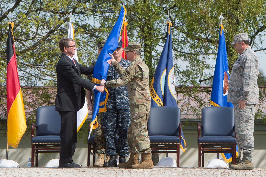 Defense Secretary Ash Carter officially changes command of U.S. European Command from Air Force Gen. Philip M. Breedlove to Army General Curtis M. Scaparrotti during a ceremony in Stuttgart, Germany, May 3, 2016. DoD photo by Navy Petty Officer 1st Class Tim D. Godbee
