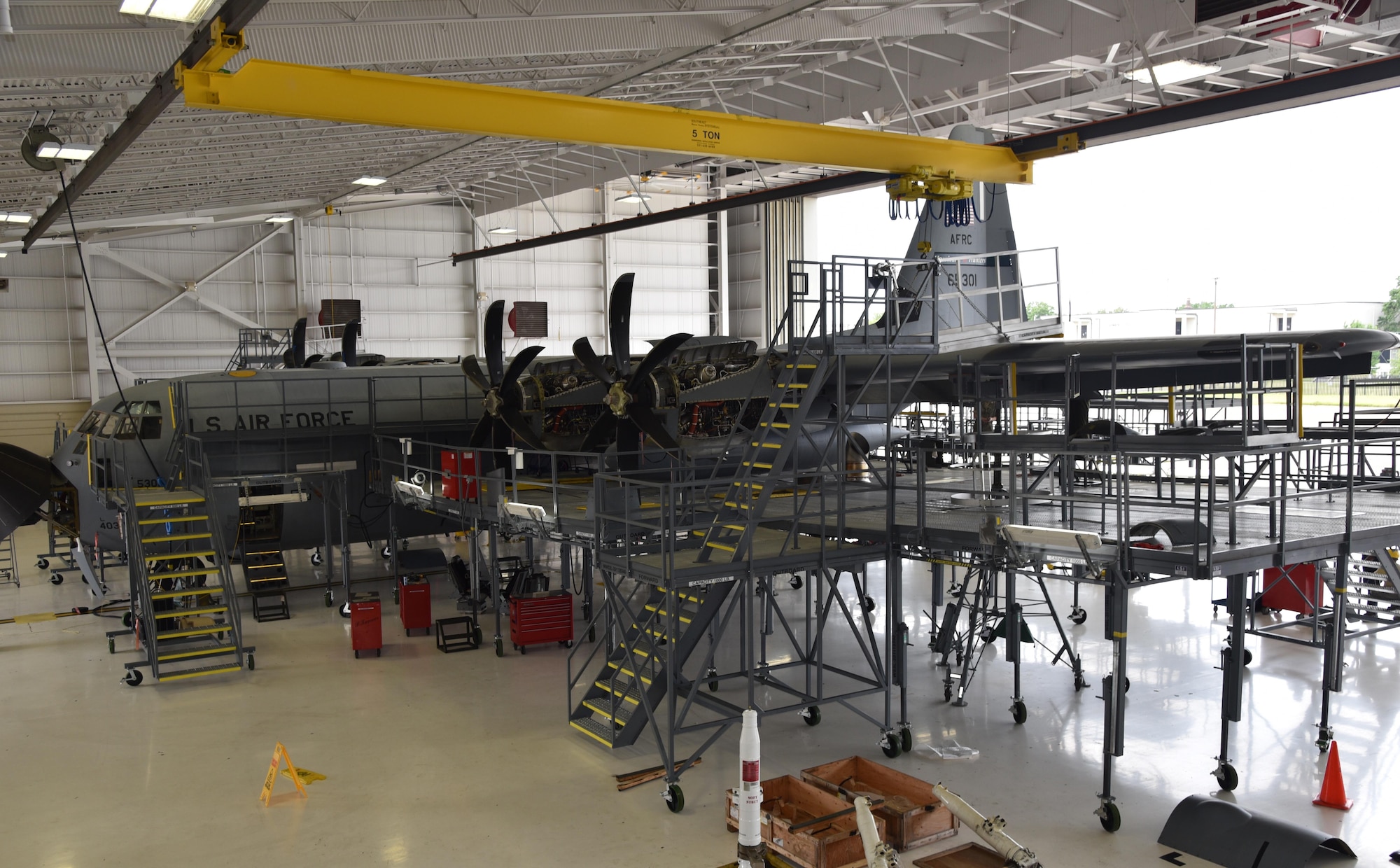 The Air Force Reserve's 403rd Maintenance Squadron Isochronal Inspection Dock at Keesler Air Force Base, Mississippi, received new maintenance platforms, commonly referred to as “stands,” April 14, 2016. The previous stands became outdated, not meeting fall protection limits, and they were not configured all the way around the aircraft. The new stands are placed completely around the aircraft to include the nose and tail sections, provide more working area and access to power and lighting. (U.S. Air Force photo/Maj. Marnee A.C. Losurdo)