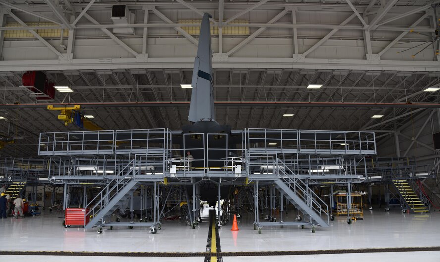 The Air Force Reserve's 403rd Maintenance Squadron Isochronal Inspection Dock at Keesler Air Force Base, Mississippi, received new maintenance platforms, commonly referred to as “stands,” April 14, 2016.The previous stands became outdated, not meeting fall protection limits, and they were not configured all the way around the aircraft. The new stands are placed completely around the aircraft to include the nose and tail sections, provide more working area and access to power and lighting. (U.S. Air Force photo/Maj. Marnee A.C. Losurdo)