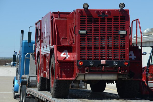 A P-19r is being loaded on to a tractor-trailer on Laughlin Air Force Base, Texas, March 14, 2016. The P-19r was pulled from the decommission roster and revamped by members of Laughlin before being deployed to support construction operations. (U.S. Air Force photo by Airman 1st Class Brandon May)