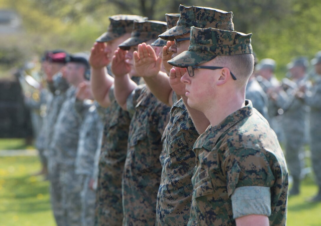 Marines salute during the U.S. European Command change-of-command ceremony in Stuttgart, Germany, May 3, 2016. Air Force Gen. Philip M. Breedlove relinquished command to Army Gen. Curtis M. Scaparrotti as commander of U.S. European Command. DoD photo by Navy Petty Officer 1st Class Tim D. Godbee