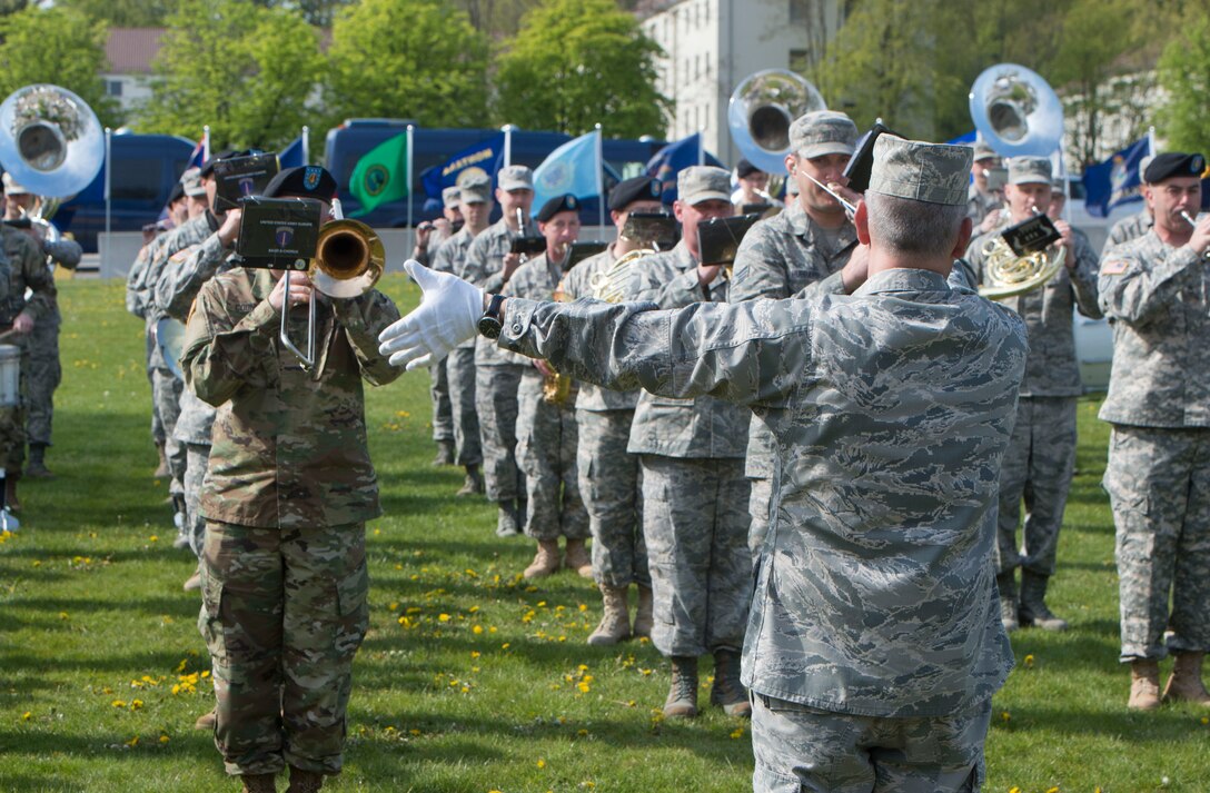 A combined Army and Air Force band performs at the U.S. European Command change-of-command ceremony in Stuttgart, Germany, May 3, 2016. Air Force Gen. Philip M. Breedlove relinquished command to Army Gen. Curtis M. Scaparrotti as commander of U.S. European Command. DoD photo by Navy Petty Officer 1st Class Tim D. Godbee