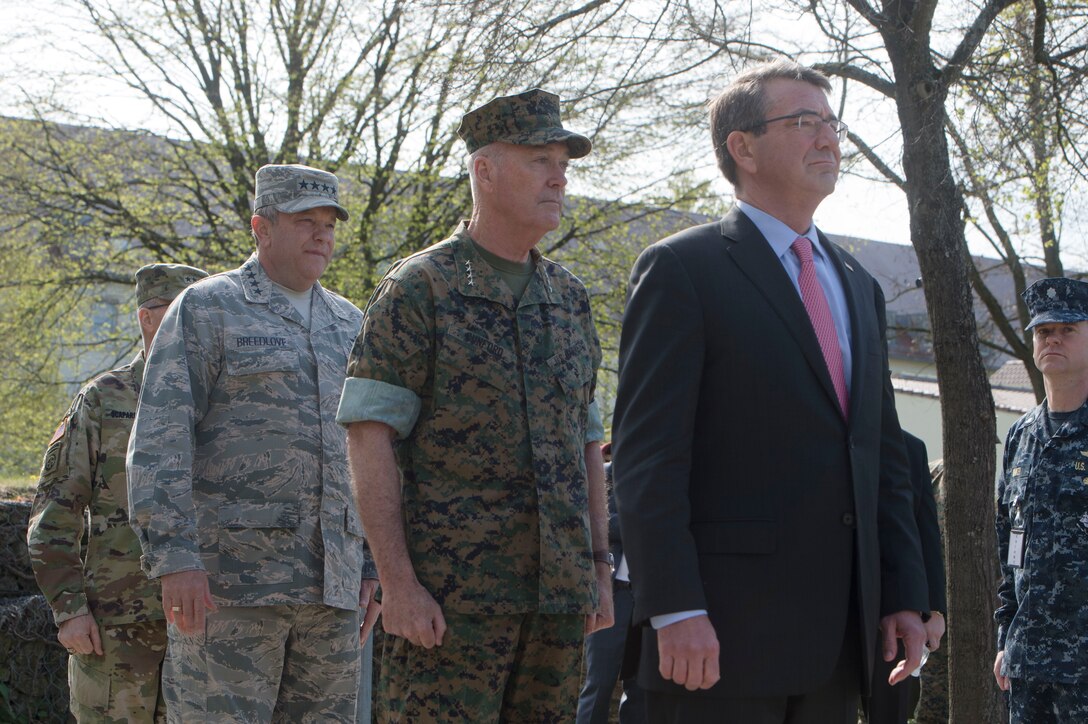 Defense Secretary Ash Carter leads the official party at the U.S. European Command change-of-command ceremony in Stuttgart, Germany, May 3, 2016. Air Force Gen. Philip M. Breedlove relinquished command to Army Gen. Curtis M. Scaparrotti as commander of U.S. European Command. DoD photo by Navy Petty Officer 1st Class Tim D. Godbee