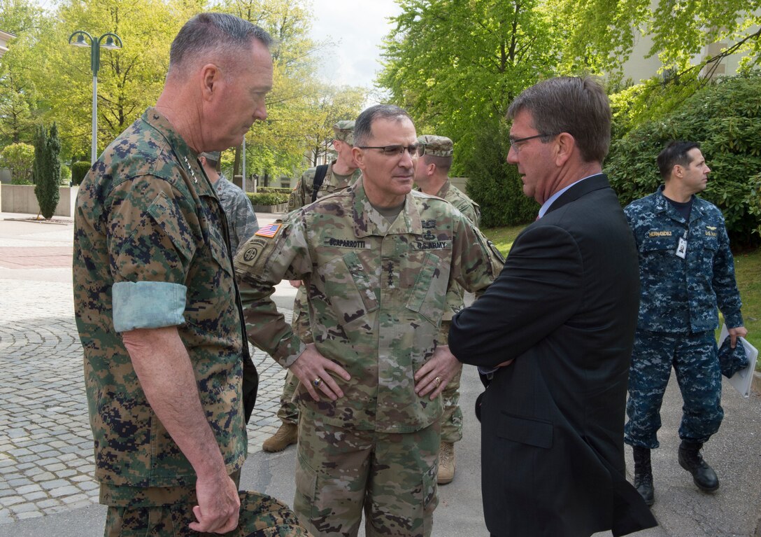 Defense Secretary Ash Carter, right, speaks with Marine Corps Gen. Joe Dunford, left, chairman of the Joint Chiefs of Staff, and Army Gen. Curtis M. Scaparrotti, the new commander of U.S. European Command, in Stuttgart, Germany, May 3, 2016. Air Force Gen. Philip M. Breedlove relinquished command to Scaparrotti during a ceremony attended by Carter and Dunford. DoD photo by Navy Petty Officer 1st Class Tim D. Godbee