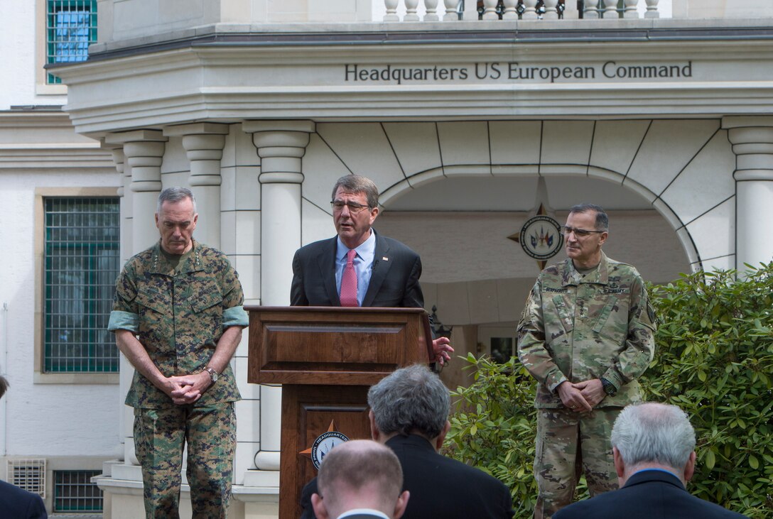 Defense Secretary Ash Carter addresses reporters with Marine Corps Gen. Joe Dunford, left, chairman of the Joint Chiefs of Staff, and Army Gen. Curtis M. Scaparrotti, the new commander of U.S. European Command, following the change-of-command ceremony in Stuttgart, Germany, May 3, 2016. DoD photo by Navy Petty Officer 1st Class Tim D. Godbee