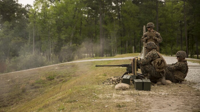 Marines with II Marine Headquarters demonstrate, to visiting family members and spouses, how to operate the .50 Caliber Machine Gun during II MHG’s: “In Their Boots Day” at Camp Lejeune, N.C., April 29, 2016. The Marines also demonstrated a firing method, “talking guns”, using two M240 Bravo Light-Machine Guns and a .50 Caliber Machine Gun. (U.S. Marine Corps photo by Cpl. Justin T. Updegraff/ Released)