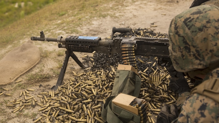 U.S. Marines with II Marine Headquarters demonstrate, to the family members and spouses, how to operate the M240 Bravo Light-Machine Gun II MHG’s: “In Their Boots Day” aboard Camp Lejeune, N.C., April 29, 2016. The Marines also demonstrated talking guns, utilizing two M240 and a .50 Caliber Machine Gun. (U.S. Marine Corps photo by Cpl. Justin T. Updegraff/ Released)