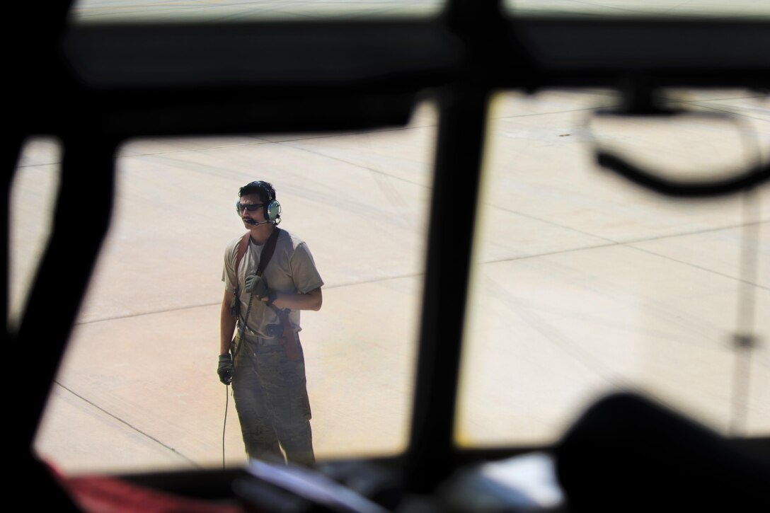 Air Force Senior Airman Chris Arnold ensures a C-130J Super Hercules aircraft's propellers are functioning properly during a preflight inspection at Bagram Airfield, Afghanistan, April 29, 2016. Arnold is a loadmaster assigned to the 774th Expeditionary Airlift Squadron. Air Force photo by Senior Airman Justyn M. Freeman