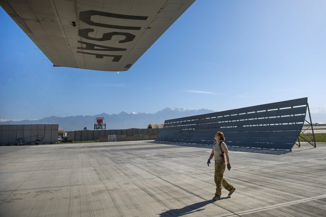 Air Force Senior Airman Jessica Jones conducts a preflight wing inspection of a C-130J Super Hercules aircraft at Bagram Airfield, Afghanistan, April 29, 2016. Jones is a loadmaster assigned to the 774th Expeditionary Airlift Squadron. Air Force photo by Senior Airman Justyn M. Freeman