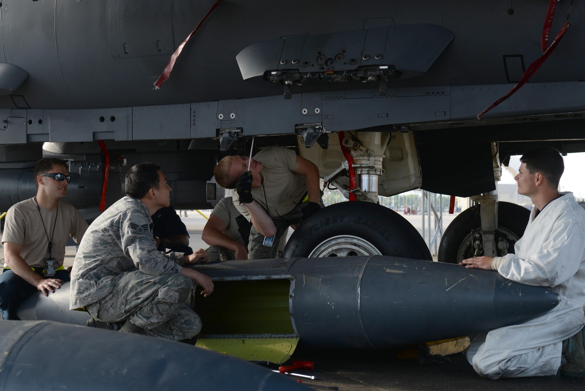 Airmen from the 4th Aircraft Maintenance Squadron inspect an F-15E Strike Eagle, April 27, 2016, at Seymour Johnson Air Force Base, North Carolina. Inspections were performed on the aircrafts to prepare for Exercise Combat Hammer. Portions of this image were masked for operational security reasons. (U.S. Air Force photo by Airman 1st Class Ashley Williamson/Released) 