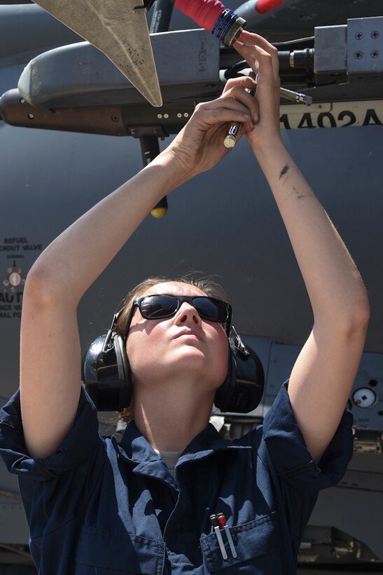 Airman 1st Class Bailey O’Dell, 4th Aircraft Maintenance Squadron armaments systems technician, works on an F-15E Strike Eagle aircraft in preparation for exercise Combat Hammer, April 26, 2016, at Seymour Johnson Air Force Base, North Carolina. Airmen from the 4th AMXS readied jets for the two-week exercise at Hill Air Force Base, Utah. (U.S. Air Force photo by Airman Shawna L. Keyes/Released)