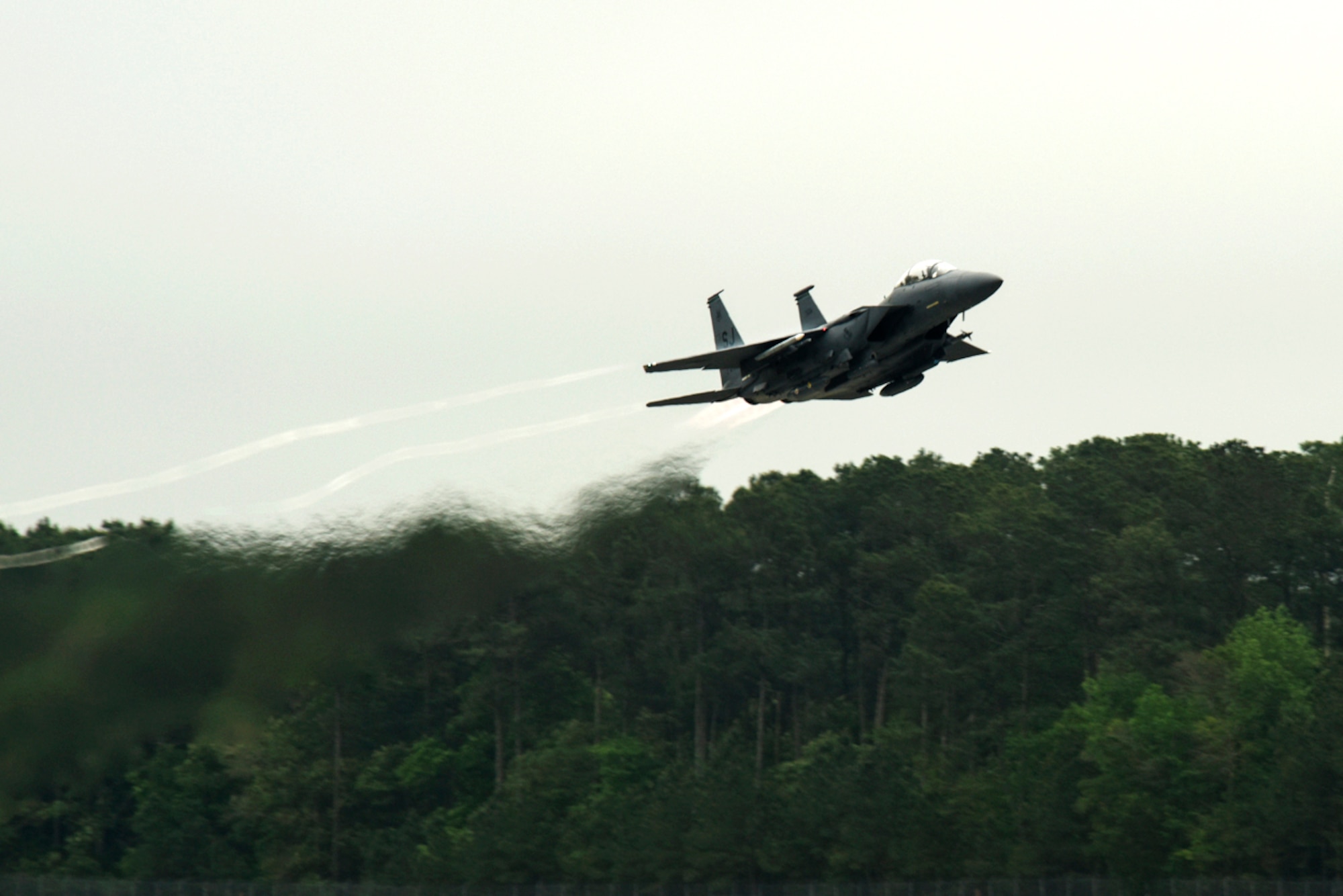 An F-15E Strike Eagle takes off in route to Hill Air Force Base, Utah, for exercise Combat Hammer, April 29, 2016, at Seymour Johnson Air Force Base, North Carolina. Approximately 14 F-15Es from the 336th Fighter Squadron left for the two-week exercise for combat training and weapons testing. (U.S. Air Force photo by Airman Shawna L. Keyes/Released)