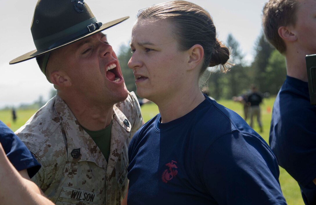 Senior Drill Instructor, Staff Sgt Trevon Wilson, encourages a poolee at the Recruiting Station Portland Aunnual pool function aboard Camp Rilea, Warrenton, Oregon. Poolees were given an oppurtunity during a 3-day training event to experience aspects of recruit training to include the presence of drill instructors and physical training.(U.S. Marine Corps photo by Sgt. Taylor Morton)