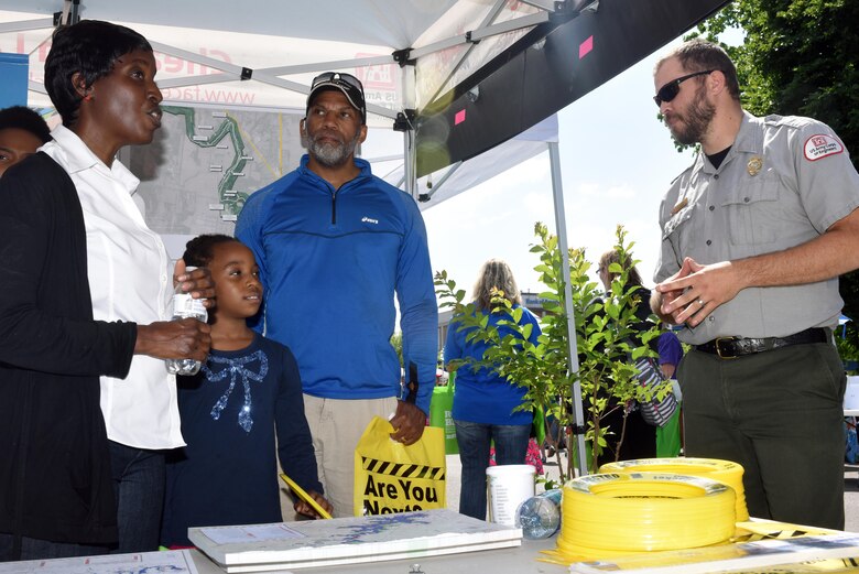 Park Ranger, Jacob Albers, discusses the importance of water safety and the recreation opportunities at nearby lakes during an Earth Day Festival on April 23, 2016.  