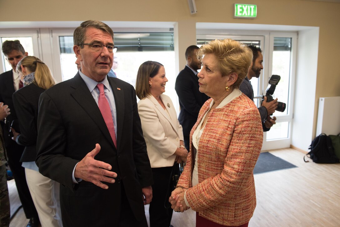 Defense Secretary Ash Carter and Ellyn Dunford, the wife of Marine Corps Gen. Joe Dunford, chairman of the Joint Chiefs of Staff, talk before the change-of-command ceremony for U.S. European Command at Patch Barracks in Stuttgart, Germany, May 3, 2016. DoD photo by D. Myles Cullen