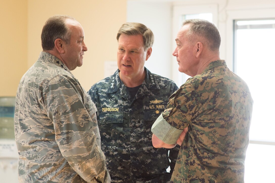 Marine Corps Gen. Joe Dunford, right, chairman of the Joint Chiefs of Staff; Navy Adm. Mark Ferguson, center, commander of Allied Joint Force Command, and Air Force Gen. Philip M. Breedlove, outgoing commander of U.S. European Command, talk before the change-of-command ceremony for U.S. European Command at Patch Barracks in Stuttgart, Germany, May 3, 2016. DoD photo by D. Myles Cullen