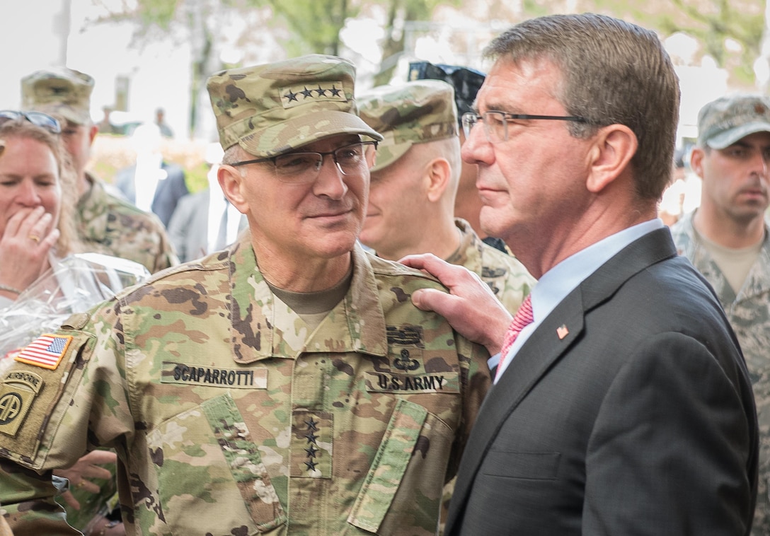 Defense Secretary Ash Carter and Army Gen. Curtis M. Scaparrotti, incoming commander of U.S. European Command, share a moment during the ceremony to change commanders in Stuttgart, Germany, May 3, 2016. DoD photo by D. Myles Cullen