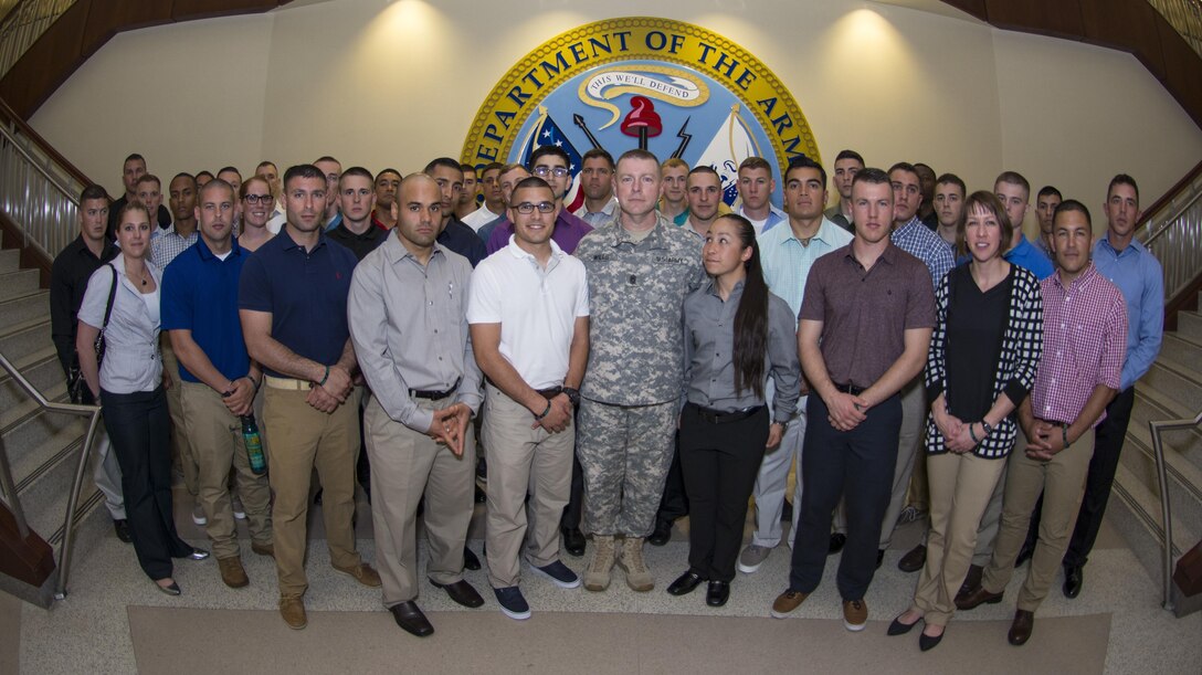 Soldiers competing in the 2016 U.S. Army Reserve Best Warrior Competition at Fort Bragg, N.C. pose for a photo with interim Command Sgt. Maj.of the Army Reserve James Wills at the United States Army Reserve Command Headquarters during the no-host social May 2. This year’s Best Warrior Competition will determine the top noncommissioned officer and junior enlisted Soldier who will represent the U.S. Army Reserve in the Department of the Army Best Warrior Competition later this year at Fort A.P. Hill, Va.  (U.S. Army photo Sgt. 1st Class Brian Hamilton/released)