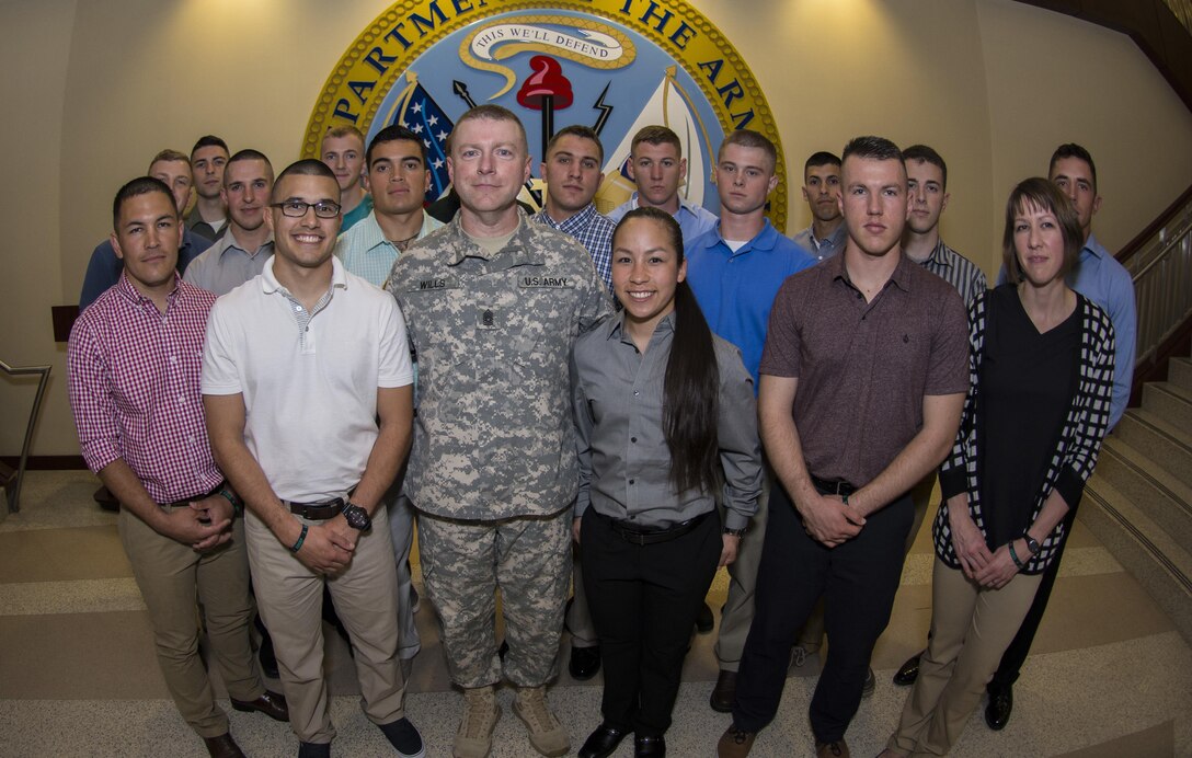 Soldiers competing for the title of Soldier of the Year in the 2016 U.S. Army Reserve Best Warrior Competition at Fort Bragg, N.C. pose for a photo with interim Command Sgt. Maj.of the Army Reserve James Wills at the United States Army Reserve Command Headquarters during the no-host social May 2. This year’s Best Warrior Competition will determine the top noncommissioned officer and junior enlisted Soldier who will represent the U.S. Army Reserve in the Department of the Army Best Warrior Competition later this year at Fort A.P. Hill, Va.  (U.S. Army photo Sgt. 1st Class Brian Hamilton/released)