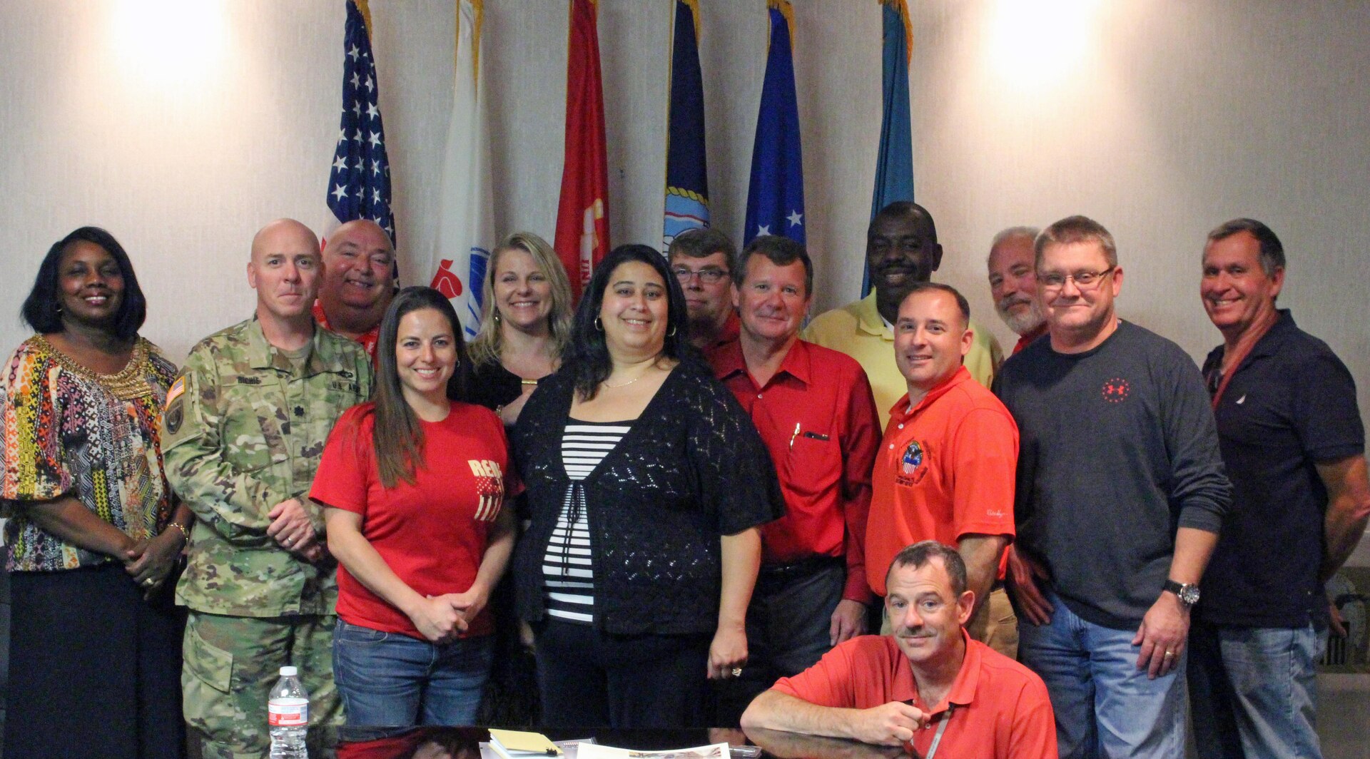 Supervisors from Defense Logistics Agency Distribution Corpus Christi, Texas, pose with trainers and distribution center commander Army Lt. Col. Brian Richie for a graduation photo after their High Performing Leadership class.